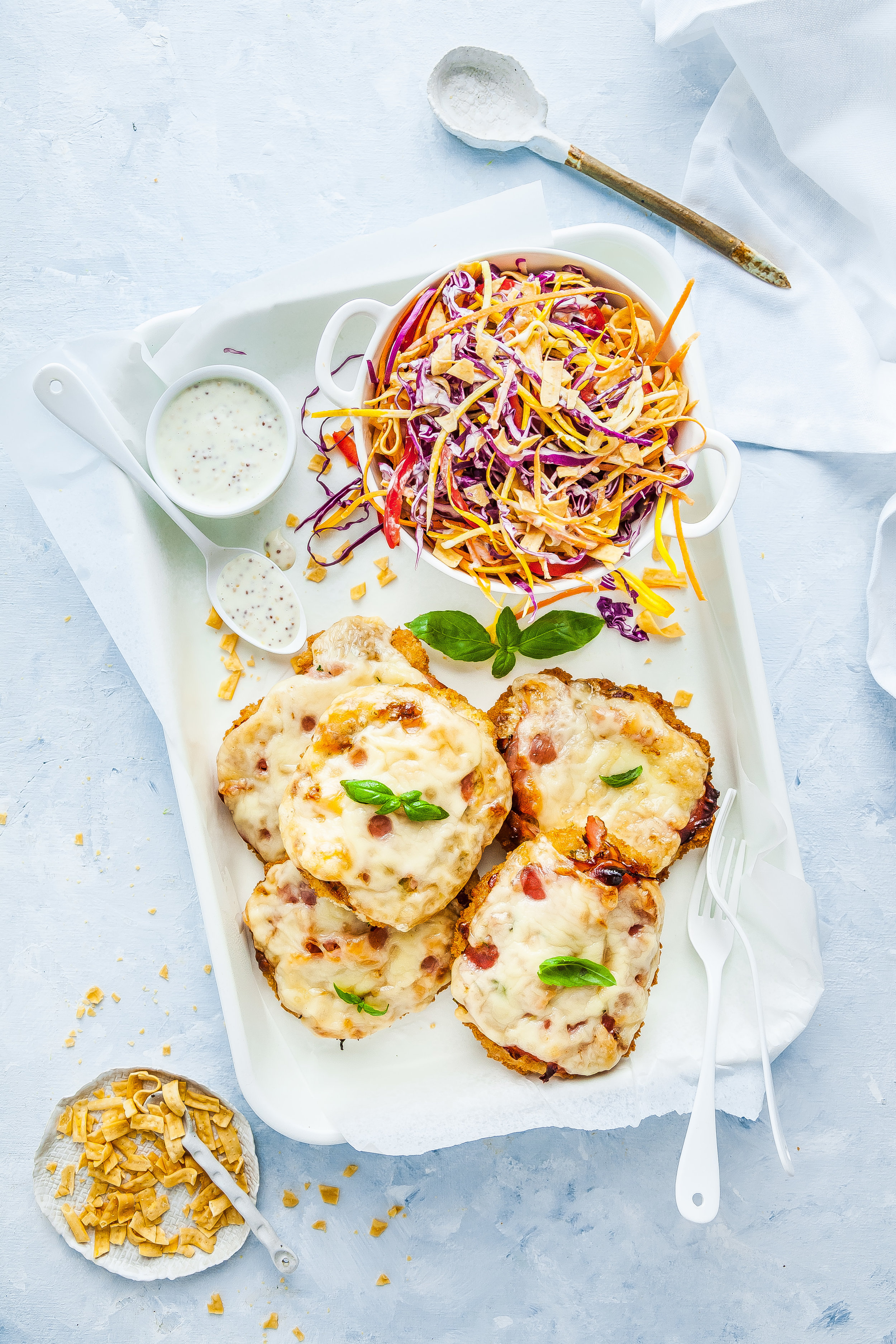 Cheesy Sun Dried Tomato & Basil Inglewood Organic Chicken Schnitzel With Crunchy Rainbow Slaw